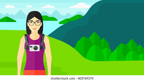 Woman with camera on chest.