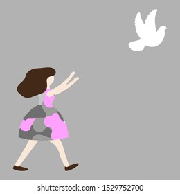 Woman in camouflage dress catches a white dove