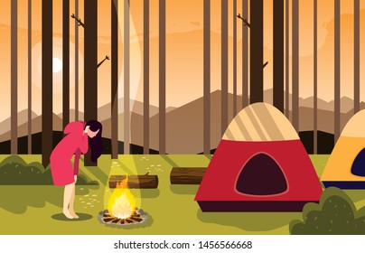 woman camping campfire forest tent