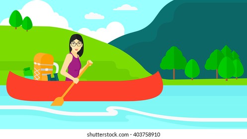 Woman canoeing on the river.