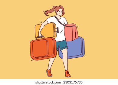 Woman carries lot of tourist suitcases when going on long trip or changing places of residence. Girl with heavy suitcases walks and smiles for concept immigration and change country