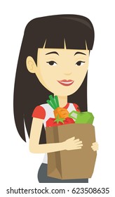 Woman carrying grocery shopping bag with vegetables. Woman holding grocery shopping bag with healthy food. Woman with grocery shopping bag. Vector flat design illustration isolated on white background