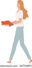 woman carrying roasted turkey dish, light brown hair, shirt, light blue pants, walking, dish contains baked potatoes around brown turkey, visible oven mitt, no face details, background