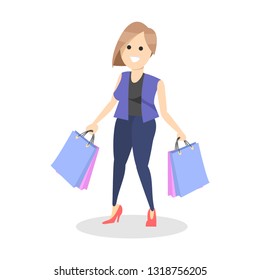 Woman carrying shopping bags with purchases