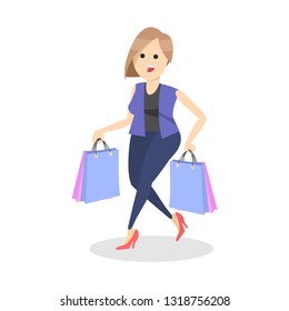 Woman carrying shopping bags with purchases