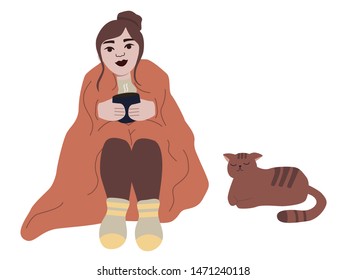 woman with cat relaxing and drinking tea/ coffee/ cocoa wrapped in a blanket on white background  