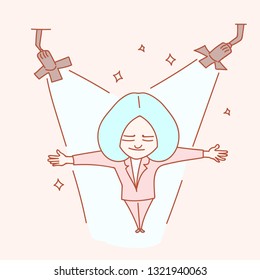 Woman celebrating success while standing in spotlight