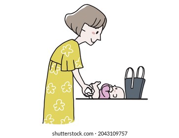 A woman changing her baby's diaper on the go