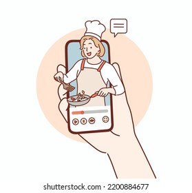 Woman chef cook at smartphone screen. It's metaphor for recipe book apps. Hand drawn style vector design illustrations.