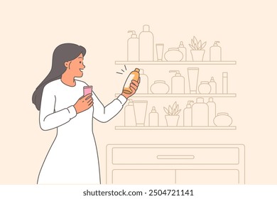 Woman chooses cosmetics for skin care standing near shelf with creams and shampoos. Happy girl reads composition of bodycare cosmetics to avoid use of non-organic balms and shower gels.