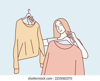 Woman choosing her fashion outfit after the shopping simple korean style illustration