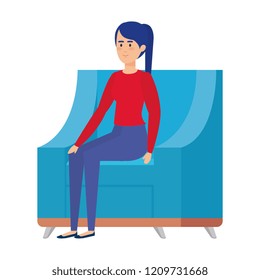 woman with christmas sweater sitting in sofa