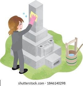 A woman cleaning a grave (visiting a Japanese grave)