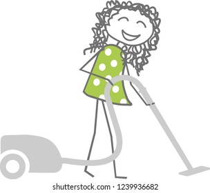 A woman cleans while vacuuming