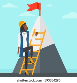 Woman climbing on mountain.