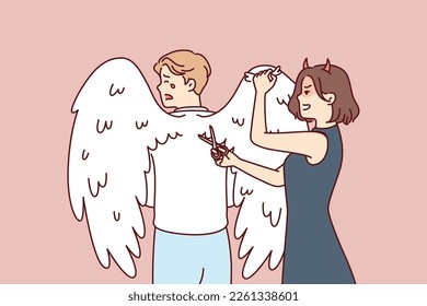 Woman with clipping wings on back crying man to limit freedom and potential. Girl with demon horns brings scissors to back of angel for concept totalitarian environment in company