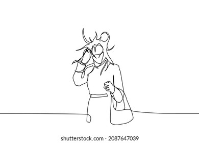 woman in coat and mask is holding bag her hair is flying away from the wind - one line drawing vector. long loose hair problem concept, spoiled hairstyle, strong wind 