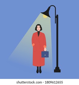 Woman in coat is standing under a glowing lantern. Autumn night, stylish girl with short hair. Woman alone walking down the street. Flat vector illustration