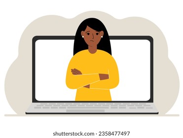 Woman communicates via videoconference through laptop screen. The concept of online meetings, webinars, remote work or work from home.