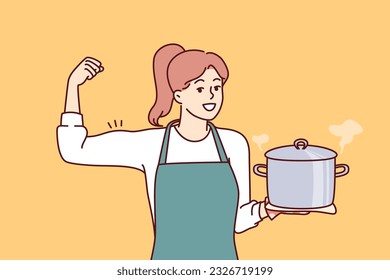 Woman cook holds pot of soup and shows biceps as sign of pride in ability to cook complex dish. Girl housewife in apron smiles inviting to eat delicious homemade food from healthy ingredients