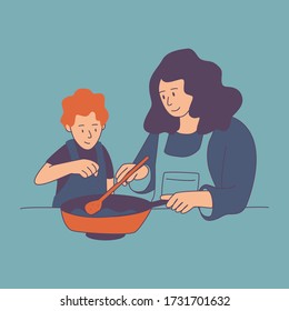 Woman cooking at home with her younger son.
