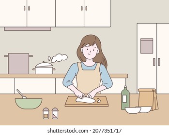 A woman is cooking in the kitchen. outline simple vector illustration.