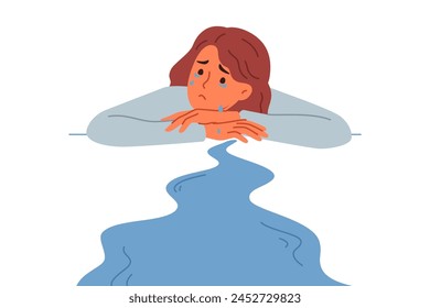 Woman cries, experiencing stress and apathy after breaking up with boyfriend, lying on desk, near puddle of tears. Depressed girl cries and needs psychological support after losing position in company