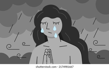 A woman crying with her hands folded in a prayer gesture in the rain on a gray windy day under storm clouds.