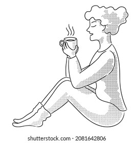 Woman with a cup of a hot beverage