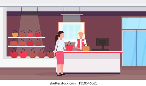 woman customer new handbag at cash desk counter big fashion shop super market female shopping mall interior. modern boutique horizontal flat