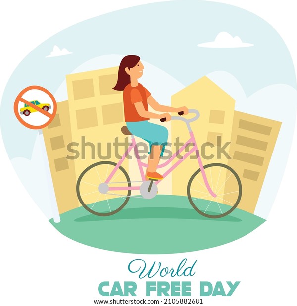 A woman is cycling in the\
middle of a deserted city because of the celebration of car free\
day