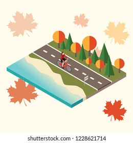 Woman cycling on countryside autumn sunny road or highway