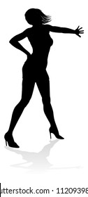 A woman dancer dancing in silhouette