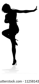 A woman dancer dancing in silhouette