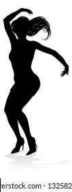 A woman dancer dancing in silhouette