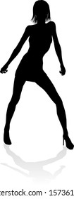 A woman dancer dancing in silhouette