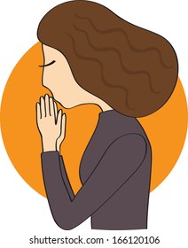 Woman in dark clothes with brown hair praying 
