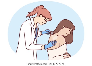 Woman dermatologist examines skin on patient back to help get rid of rash or acne. Girl in white coat works as dermatologist in private clinic and uses flashlight to give useful skincare tips