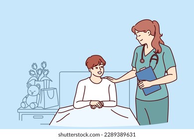 Woman doctor near boy lying on bed in hospital after complications of chronic disease. Doctor pediatrician supports teenager undergoing rehabilitation in hospital after complex operation 