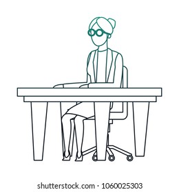 Woman doctor seated at desk