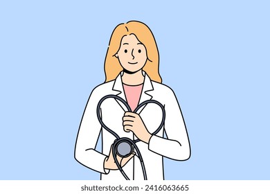 Woman doctor with stethoscope in hands smiles, urging to undergo preventive medical examination in clinic. Girl works as doctor or nurse, dressed in white coat and enjoys helping patients