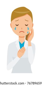 A woman doctor wearing a white suit is crying