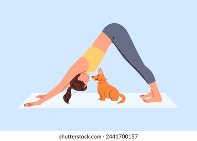 Woman does pilates on yoga mats and does stretching located near with funny puppy. Slender girl in sportswear for pilates, training, wanting to stay healthy and beautiful for long time