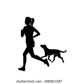 Woman and dog running and exercising outdoor at grass field on summer or spring. Happy female athlete training with her pet.