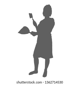 The woman doing the cleaning. Silhouette standing girl holding a brush and a scoop.