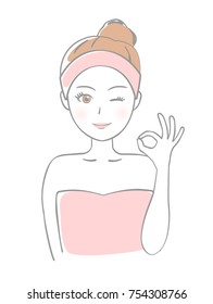 Woman doing an okay sign