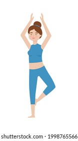 Woman Doing Tree Pose Of Yoga