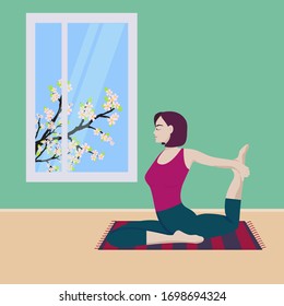 Woman doing yoga activity at home. Stay at home and things to do in self isolation and social distancing during epidemic of corona virus.