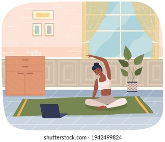 Woman doing yoga exercise. Young dark skinned fit girl sitting in lotus position, doing stretching