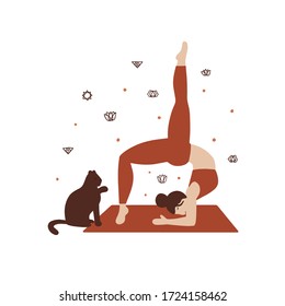 Woman doing yoga at home. Cat is watching for her yoga class.